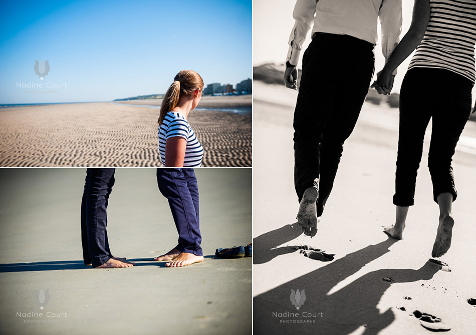 Couple marchant sur le sable à marée basse